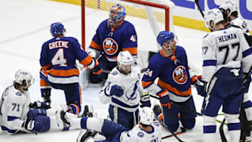 UNIONDALE, NEW YORK - JUNE 17: Brayden Point #21 of the Tampa Bay Lightning is congratulated by Steven Stamkos #91 after scoring a goal past Semyon Varlamov #40 of the New York Islanders during the second period in Game Three of the Stanley Cup Semifinals during the 2021 Stanley Cup Playoffs at Nassau Coliseum on June 17, 2021 in Uniondale, New York. (Photo by Elsa/Getty Images)