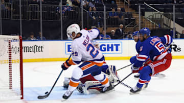 NEW YORK, NEW YORK - SEPTEMBER 26: Brock Nelson #29 of the New York Islanders scores a first period goal against Alexandar Georgiev #40 of the New York Rangers in a preseason game at Madison Square Garden on September 26, 2021 in New York City. (Photo by Bruce Bennett/Getty Images)