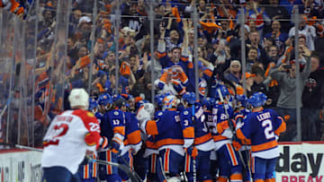 NEW YORK, NY - APRIL 24: The New York Islanders celebrate a 2-1 double overtime victory over the Florida Panthers in Game Six of the Eastern Conference First Round during the 2016 NHL Stanley Cup Playoffs at the Barclays Center on April 24, 2016 in the Brooklyn borough of New York City. The Islanders won the game 2-1 to win the series four games to two. (Photo by Bruce Bennett/Getty Images)