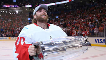TORONTO, ON - SEPTEMBER 29: Braden Holtby #70 of Team Canada skates with the trophy after his team won the World Cup of Hockey Championship against Team Europe during Game Two of the World Cup of Hockey final series at the Air Canada Centre on September 29, 2016 in Toronto, Canada. The Team Canada defeated Team Europe 2-1. (Photo by Bruce Bennett/Getty Images)