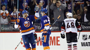 NEW YORK, NY - OCTOBER 24: Andrew Ladd #16 and Brock Nelson #29 of the New York Islanders celebrate Nelson's power play goal at 4:31 of the third period against the Arizona Coyotes at the Barclays Center on October 24, 2017 in the Brooklyn borough of New York City. (Photo by Bruce Bennett/Getty Images)