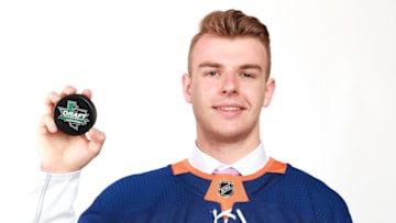 DALLAS, TX - JUNE 23: Bode Wilde poses after being selected 41st by the New York Islanders during the 2018 NHL Draft at American Airlines Center on June 23, 2018 in Dallas, Texas. (Photo by Tom Pennington/Getty Images)