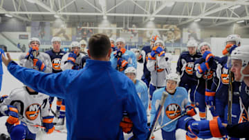 SYOSSET, NY - SEPTEMBER 13: Coach Scott Gordon of the New York Islanders talks to players during rookie training camp at Ice Works on September 13, 2010 in Syosset, New York. (Photo by Lou Capozzola/Getty Images)