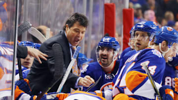 NEW YORK, NY - MARCH 14: Jack Capuano of the New York Islanders gives players instructions in the final minutes of the game against the Florida Panthers at the Barclays Center on March 14, 2016 in the Brooklyn borough of New York City. The Islanders defeated the Panthers 3-2. (Photo by Bruce Bennett/Getty Images)
