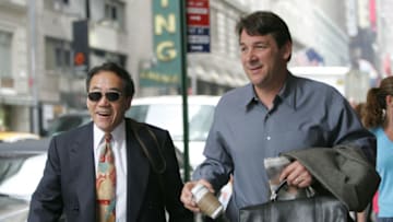 NEW YORK - APRIL 20: Charles Wang (L), owner of the New York Islanders and General Manager Mike Milbury arrive at the Westin New York Hotel for the NHL Board of Governors meeting on April 20, 2005 in New York City. (Photo by Bruce Bennett/Getty Images)