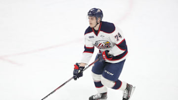 LONDON, ON - MARCH 09: Bode Wilde #74 of the Saginaw Spirit skates out with the puck in the third period during OHL game action against the London Knights at Budweiser Gardens on March 9, 2019 in London, Canada. (Photo by Tom Szczerbowski/Getty Images)