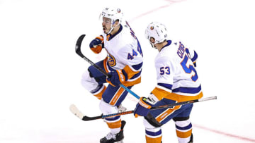 TORONTO, ONTARIO - AUGUST 26: Jean-Gabriel Pageau #44 of the New York Islanders is congratulated by his teammate, Casey Cizikas #53, after scoring the game-tying goal against the Philadelphia Flyers during the third period in Game Two of the Eastern Conference Second Round during the 2020 NHL Stanley Cup Playoffs at Scotiabank Arena on August 26, 2020 in Toronto, Ontario. (Photo by Elsa/Getty Images)