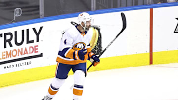 TORONTO, ONTARIO - SEPTEMBER 05: Andy Greene #4 of the New York Islanders celebrates after scoring a goal against the Philadelphia Flyers during the first period in Game Seven of the Eastern Conference Second Round during the 2020 NHL Stanley Cup Playoffs at Scotiabank Arena on September 05, 2020 in Toronto, Ontario. (Photo by Elsa/Getty Images)