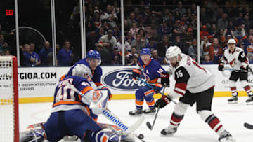 UNIONDALE, NEW YORK - MARCH 24: Robin Lehner #40 of the New York Islanders stops a short-handed attempt by Brad Richardson #15 of the Arizona Coyotes during the third period at NYCB Live's Nassau Coliseum on March 24, 2019 in Uniondale, New York. The Islanders shut-out the Coyotes 2-0.(Photo by Bruce Bennett/Getty Images)