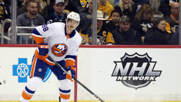 Mar 3, 2018; Pittsburgh, PA, USA; New York Islanders defenseman Brandon Davidson (88) handles the puck against the Pittsburgh Penguins during the first period at PPG PAINTS Arena. The Penguins won 3-2 in overtime. Mandatory Credit: Charles LeClaire-USA TODAY Sports