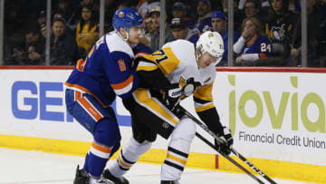 Nov 21, 2019; Brooklyn, NY, USA; New York Islanders defenseman Ryan Pulock (6) and Pittsburgh Penguins center Evgeni Malkin (71) battle for position during the third period at Barclays Center. Mandatory Credit: Andy Marlin-USA TODAY Sports