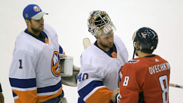 Aug 20, 2020; Toronto, Ontario, CAN; New York Islanders goaltender Semyon Varlamov (40) meets with Washington Capitals left wing Alex Ovechkin (8) following game five of the first round of the 2020 Stanley Cup Playoffs at Scotiabank Arena. Mandatory Credit: Dan Hamilton-USA TODAY Sports