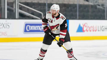 May 7, 2021; San Jose, California, USA; Arizona Coyotes defenseman Alex Goligoski (33) controls the puck during the second period against the San Jose Sharks at SAP Center at San Jose. Mandatory Credit: Stan Szeto-USA TODAY Sports