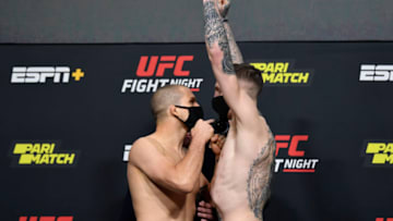 LAS VEGAS, NEVADA - NOVEMBER 13: (L-R) Opponents Alex Morono and Rhys McKee of Northern Ireland face off during the UFC weigh-in at UFC APEX on November 13, 2020 in Las Vegas, Nevada. (Photo by Jeff Bottari/Zuffa LLC)