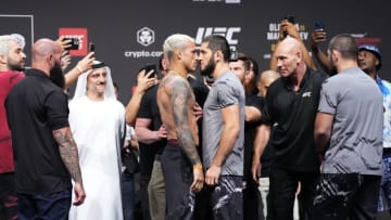 ABU DHABI, UNITED ARAB EMIRATES - OCTOBER 21: (L-R) Opponents Charles Oliveira of Brazil and Islam Makhachev of Russia face off during the UFC 280 ceremonial weigh-in at Etihad Arena on October 21, 2022 in Abu Dhabi, United Arab Emirates. (Photo by Chris Unger/Zuffa LLC)