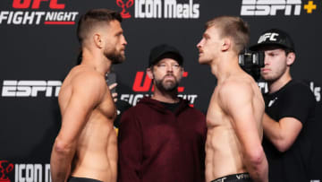 LAS VEGAS, NEVADA - OCTOBER 28: (L-R) Opponents Calvin Kattar and Arnold Allen of England face off during the UFC weigh-in at UFC APEX on October 28, 2022 in Las Vegas, Nevada. (Photo by Chris Unger/Zuffa LLC via Getty Images)