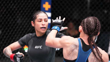 LAS VEGAS, NEVADA - NOVEMBER 05: (L-R) Polyana Viana of Brazil punches Jinh Yu Frey in a strawweight fight during the UFC Fight Night event at UFC APEX on November 05, 2022 in Las Vegas, Nevada. (Photo by Chris Unger/Zuffa LLC)