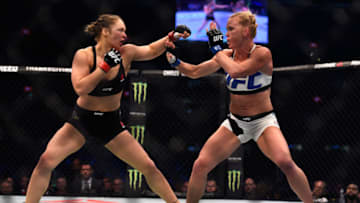 MELBOURNE, AUSTRALIA - NOVEMBER 15: (L-R) Ronda Rousey faces Holly Holm in their UFC women's bantamweight championship bout during the UFC 193 event at Etihad Stadium on November 15, 2015 in Melbourne, Australia. (Photo by Jeff Bottari/Zuffa LLC/Zuffa LLC via Getty Images)