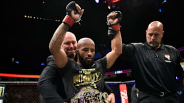 LAS VEGAS, NV - OCTOBER 07: Demetrious Johnson celebrates after his submission victory over Ray Borg in their UFC flyweight championship bout during the UFC 216 event inside T-Mobile Arena on October 7, 2017 in Las Vegas, Nevada. (Photo by Jeff Bottari/Zuffa LLC/Zuffa LLC via Getty Images)