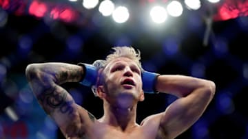 NEW YORK, NEW YORK - JANUARY 19: TJ Dillashaw reacts to the judge's decision that ended his UFC Flyweight title match against Henry Cejudo at UFC Fight Night at Barclays Center on January 19, 2019 in New York City. (Photo by Sarah Stier/Getty Images)