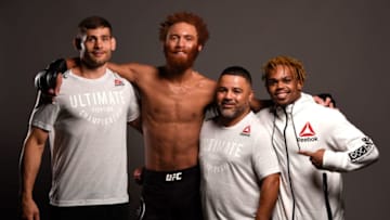 GREENVILLE, SC - JUNE 22: Luis Pena poses for a portrait backstage with his team during the UFC Fight Night event at Bon Secours Wellness Arena on June 22, 2019 in Greenville, South Carolina. (Photo by Todd Lussier/Zuffa LLC/Zuffa LLC via Getty Images)