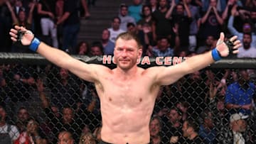 ANAHEIM, CALIFORNIA - AUGUST 17: Stipe Miocic celebrates his TKO victory over Daniel Cormier in their heavyweight championship bout during the UFC 241 event at the Honda Center on August 17, 2019 in Anaheim, California. (Photo by Josh Hedges/Zuffa LLC/Zuffa LLC via Getty Images)