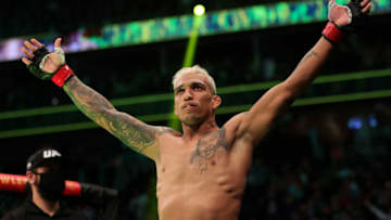 LAS VEGAS, NEVADA - DECEMBER 11: Charles Oliveira of Brazil is introduced before his lightweight title fight against Dustin Poirier during the UFC 269 event at T-Mobile Arena on December 11, 2021 in Las Vegas, Nevada. (Photo by Carmen Mandato/Getty Images)