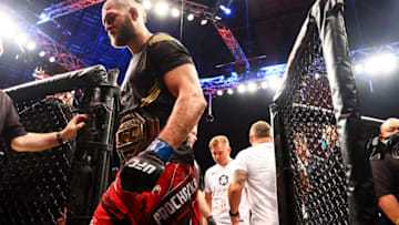 SINGAPORE, SINGAPORE - JUNE 12: Jiri Prochazka of Czech Republic leaves the cage after fighting Glover Teixeira of Brazil during their light Heavyweight Championship Fight at Singapore Indoor Stadium on June 12, 2022 in Singapore. (Photo by Yong Teck Lim/Getty Images)