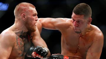 LAS VEGAS, NV - AUGUST 20: Conor McGregor (L) and Nate Diaz battle during their welterweight rematch at the UFC 202 event at T-Mobile Arena on August 20, 2016 in Las Vegas, Nevada. (Photo by Steve Marcus/Getty Images)