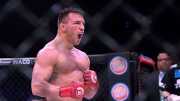 INGLEWOOD, CA - JANUARY 20: Michael Chandler Jr (red gloves) celebrates after defeating Goiti Yamauchi (blue gloves) in their Lightweight fight at Bellator 192 at The Forum on January 20, 2018 in Inglewood, California. Michael Chandler Jr won by unanimous decision. (Photo by Jayne Kamin-Oncea/Getty Images)