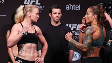 MONTEVIDEO, URUGUAY - AUGUST 09: (L-R) Valentina Shevchenko and Liz Carmouche face off during the UFC Fight Night official weigh-in at Antel Arena on August 9, 2019 in Montevideo, Uruguay. (Photo by Alexandre Schneider /Zuffa LLC/Zuffa LLC)