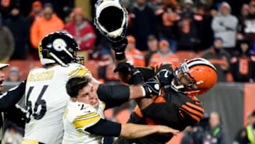 CLEVELAND, OHIO - NOVEMBER 14: Quarterback Mason Rudolph #2 of the Pittsburgh Steelers fights with defensive end Myles Garrett #95 of the Cleveland Browns during the second half at FirstEnergy Stadium on November 14, 2019 in Cleveland, Ohio. The Browns defeated the Steelers 21-7. (Photo by Jason Miller/Getty Images)