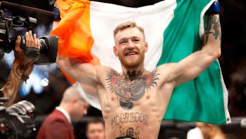 LAS VEGAS, NV - DECEMBER 12: Conor McGregor celebrates after a first-round knockout victory over Jose Aldo in their featherweight title fight during UFC 194 on December 12, 2015 in Las Vegas, Nevada. (Photo by Steve Marcus/Getty Images)