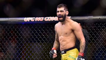 Sep 22, 2018; Sao Paulo, Brazil; Elizeu Zaleski dos Santos (red gloves) fights Luigi Vendramini (blue gloves) during UFC Fight Night at Ginasio do Ibirapuera. Mandatory Credit: Jason Silva-USA TODAY Sports