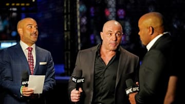 Apr 24, 2021; Jacksonville, Florida, USA; UFC ringside announcer Brendan Fitzgerald, UFC ringside announcer Joe Rogan and UFC ringside announcer Jon Anik during UFC 261 at VyStar Veterans Memorial Arena. Mandatory Credit: Jasen Vinlove-USA TODAY Sports
