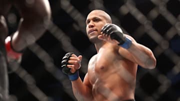 Aug 7, 2021; Houston, Texas, USA; Derrick Lewis (red gloves) fights Ciryl Gane (blue gloves) during UFC 265 at Toyota Center. Mandatory Credit: Troy Taormina-USA TODAY Sports