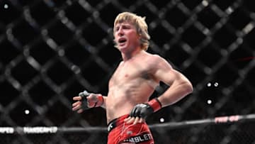 Mar 19, 2022; London, UK; Paddy Pimblett (red gloves) defeats Kazula Vargas (blue gloves) during UFC Fight Night at O2 Arena. Mandatory Credit: Per Haljestam-USA TODAY Sports