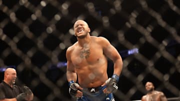 Aug 7, 2021; Houston, Texas, USA; Ciryl Gane (blue gloves) reacts during the fight against Derrick Lewis (red gloves) during UFC 265 at Toyota Center. Mandatory Credit: Troy Taormina-USA TODAY Sports
