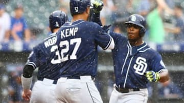 Jul 30, 2015; New York City, NY, USA; San Diego Padres left fielder left fielder Justin Uptons (R) celebrates after hitting a three run home run in the ninth inning against the New York Mets at Citi Field. Mandatory Credit: Andy Marlin-USA TODAY Sports