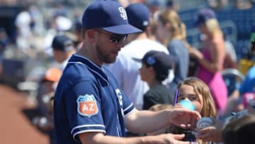 Mar 19, 2016; Peoria, AZ, USA; San Diego Padres manager Andy Green (14) signs autographs prior to the game against the Colorado Rockies at Peoria Sports Complex. Mandatory Credit: Joe Camporeale-USA TODAY Sports