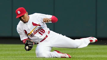 Jun 1, 2015; St. Louis, MO, USA; St. Louis Cardinals center fielder Jon Jay (19) catches a ball hit by Milwaukee Brewers catcher Jonathan Lucroy (not pictured) during the first inning at Busch Stadium. Mandatory Credit: Jeff Curry-USA TODAY Sports