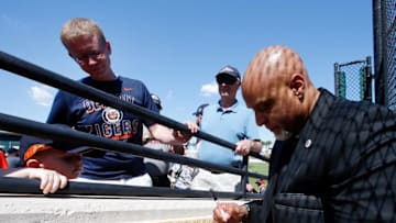 Mar 1, 2016; Lakeland, FL, USA; Detroit Tigers former player Tony Clark signs an autograph before the game against the Pittsburgh Pirates at Joker Marchant Stadium. Mandatory Credit: Butch Dill-USA TODAY Sports