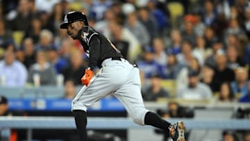 April 28, 2016; Los Angeles, CA, USA; Miami Marlins second baseman Dee Gordon (9) against the Los Angeles Dodgers at Dodger Stadium. Mandatory Credit: Gary A. Vasquez-USA TODAY Sports