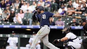 Apr 8, 2016; Denver, CO, USA; Colorado Rockies shortstop Trevor Story (27) singles in the ninth inning against the San Diego Padres at Coors Field. The Padres defeated the Rockies 13-6. Mandatory Credit: Ron Chenoy-USA TODAY Sports