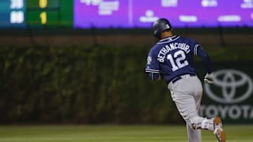 May 11, 2016; Chicago, IL, USA; San Diego Padres catcher Christian Bethancourt (12) rounds the bases after hitting a solo home run against the Chicago Cubs during the fifth inning at Wrigley Field. Mandatory Credit: Kamil Krzaczynski-USA TODAY Sports