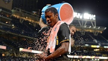 May 20, 2016; San Diego, CA, USA; San Diego Padres left fielder Melvin Upton Jr. (C) is doused with Powerade by right fielder Matt Kemp (27) after hitting a two run walk off home run to beat the Los Angeles Dodgers 7-6 at Petco Park. Mandatory Credit: Jake Roth-USA TODAY Sports