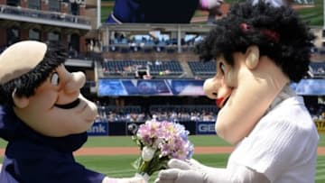 May 8, 2016; San Diego, CA, USA; San Diego Padres mascot The Swingin Friar (L) gives his mother flowers for Mother