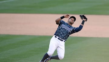 May 22, 2016; San Diego, CA, USA; San Diego Padres third baseman Yangervis Solarte (26) catches a pop fly off the bat of Los Angeles Dodgers center fielder Joc Pederson (not pictured) to end the top of the 15th inning at Petco Park. Mandatory Credit: Jake Roth-USA TODAY Sports