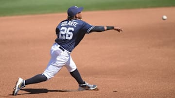 Mar 19, 2016; Peoria, AZ, USA; San Diego Padres third baseman Yangervis Solarte (26) throws a ball to first base during the fourth inning against the Colorado Rockies at Peoria Sports Complex. Mandatory Credit: Joe Camporeale-USA TODAY Sports