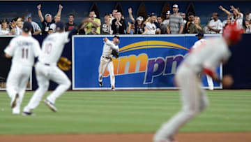Aug 6, 2016; San Diego, CA, USA; San Diego Padres center fielder Travis Jankowski (C) throws the ball back in after making a catch on a ball hit by Philadelphia Phillies center fielder Odubel Herrera (not pictured) during the ninth inning at Petco Park. Mandatory Credit: Jake Roth-USA TODAY Sports